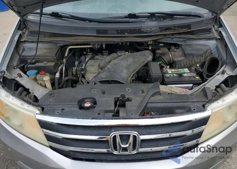 2012 Honda Odyssey Touring z USA, uszkodzony, nr VIN 5FNRL5H9XCB043913